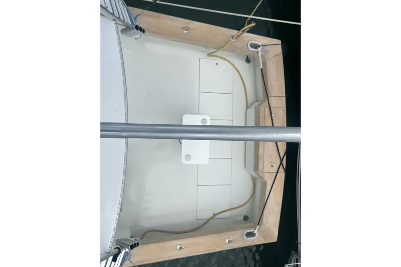  Yacht Photos Pics 1993 Buddy Davis 38 Express boat deck with clean, spacious layout and visible railing.