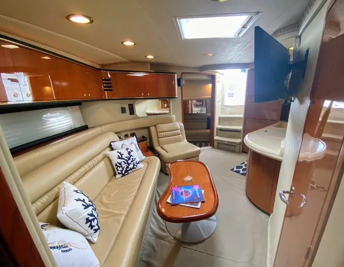  Yacht Photos Pics Luxurious interior of 2001 Sea Ray 460 Sundancer yacht with leather seating and modern amenities.