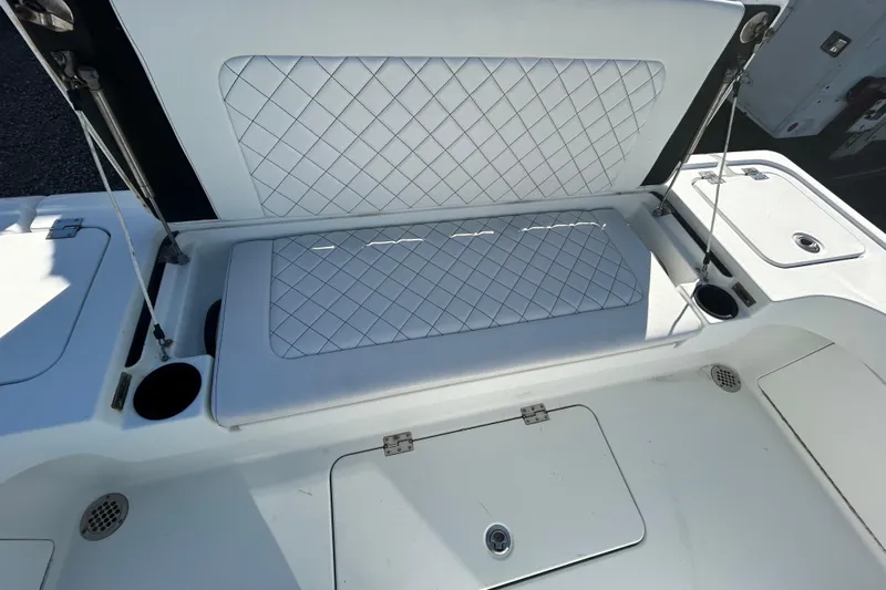  Yacht Photos Pics 2017 Baker Boatworks 26 Open with cushioned seating and storage compartments.