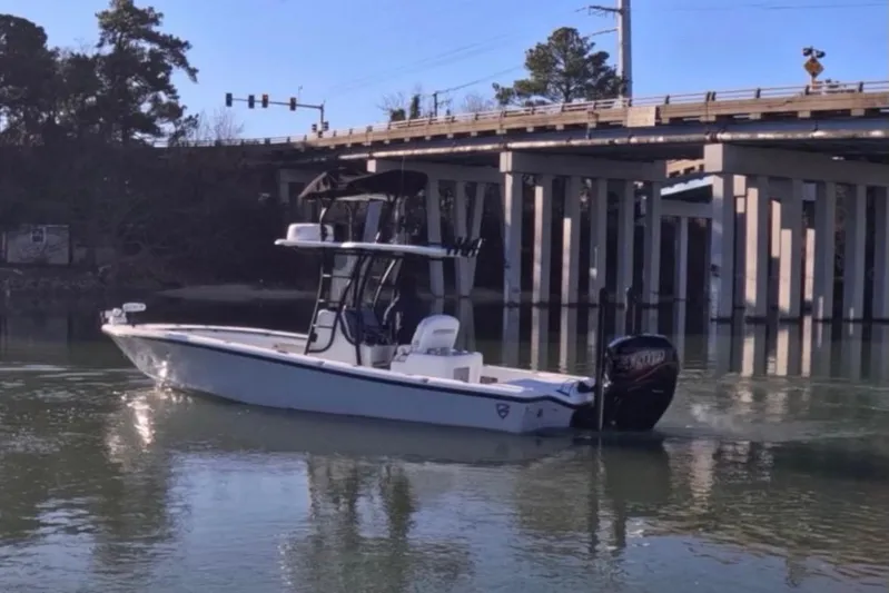 Yacht Photos Pics 2017 Baker Boatworks 26 Open on calm water near a bridge.