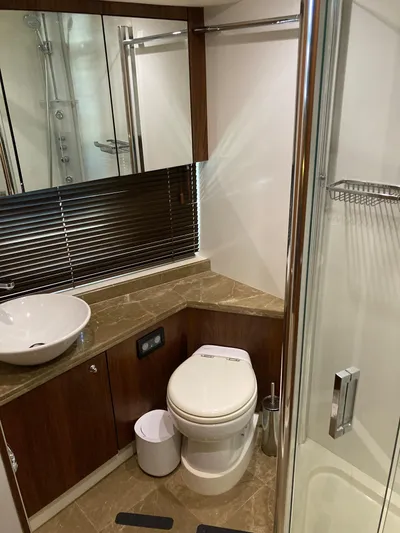 La Chaparrita Yacht Photos Pics Luxurious bathroom in 2011 Sunseeker Manhattan 70 yacht with modern fixtures.