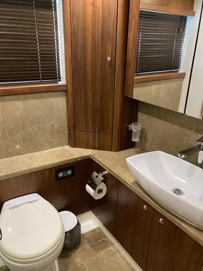 La Chaparrita Yacht Photos Pics Luxurious bathroom in a 2011 Sunseeker Manhattan 70 yacht with modern fixtures.