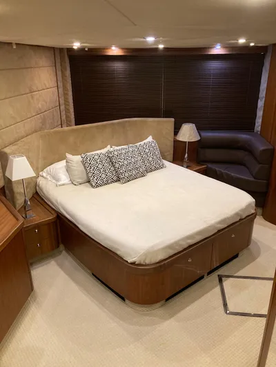 La Chaparrita Yacht Photos Pics Luxurious bedroom in a 2011 Sunseeker Manhattan 70 yacht with modern decor.