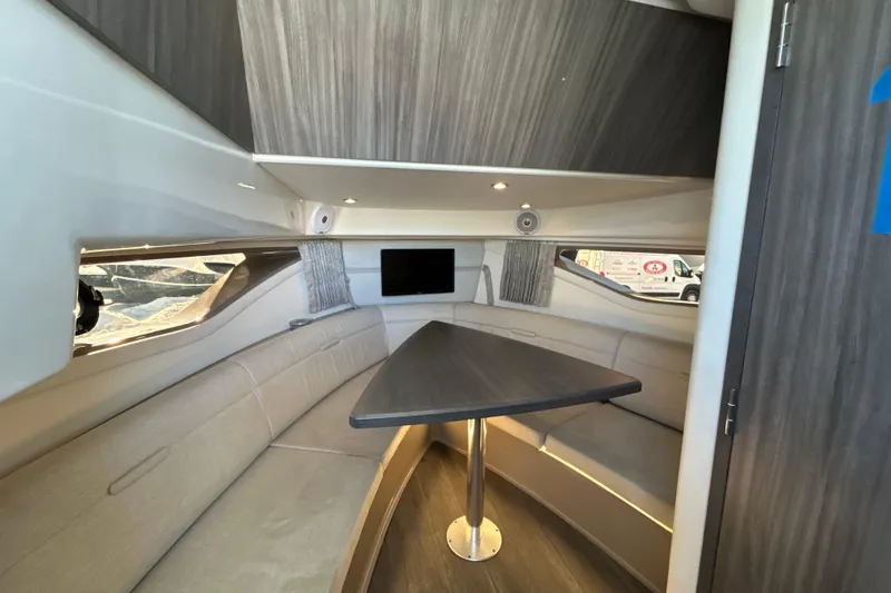  Yacht Photos Pics Interior of 2021 Sea Ray Sundancer 320, featuring a cozy seating area and modern design.