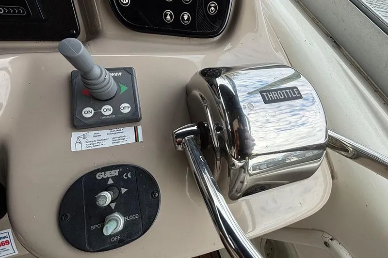  Yacht Photos Pics Control panel of a 2005 Sea Ray 340 Sundancer boat with throttle and switches.