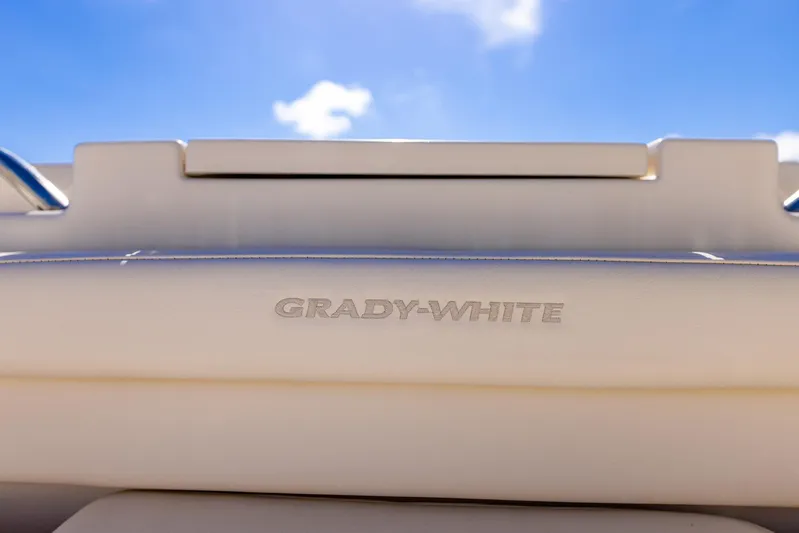  Yacht Photos Pics 2022 Grady-White Canyon 336 boat detail against blue sky.