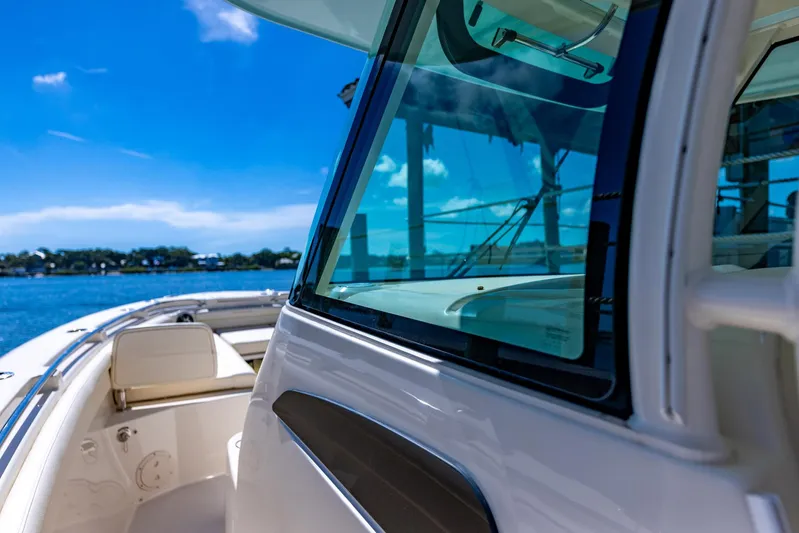  Yacht Photos Pics 2022 Grady-White Canyon 336 boat on sunny day, close-up view.