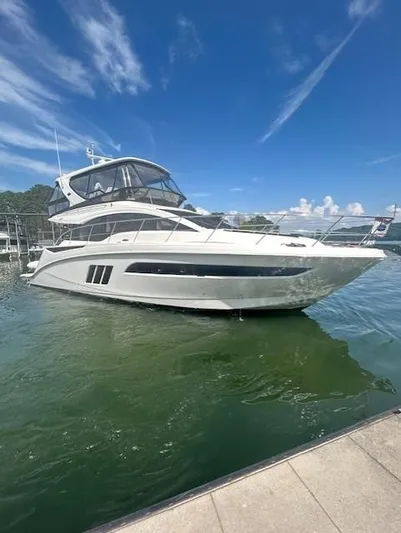 Yonder Star Yacht Photos Pics 2016 Sea Ray 510 Fly yacht on water under clear blue sky.