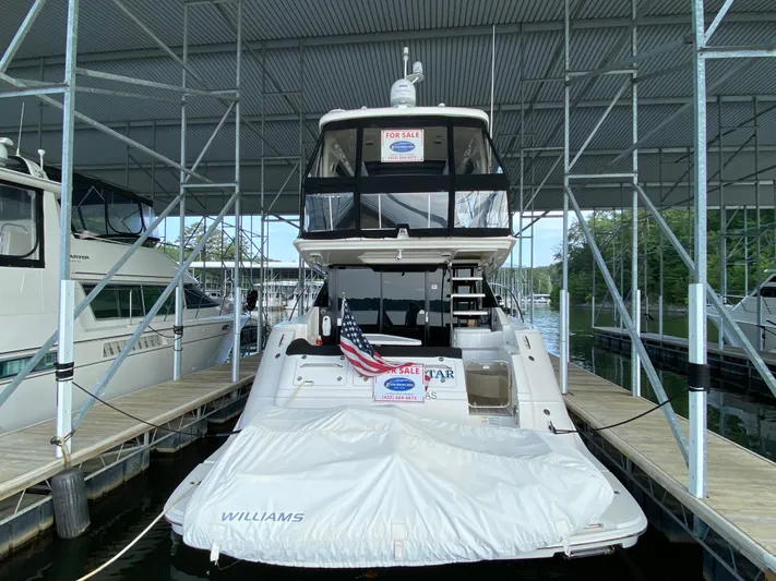 Yonder Star Yacht Photos Pics 2016 Sea Ray 510 Fly yacht for sale, docked under a covered marina.