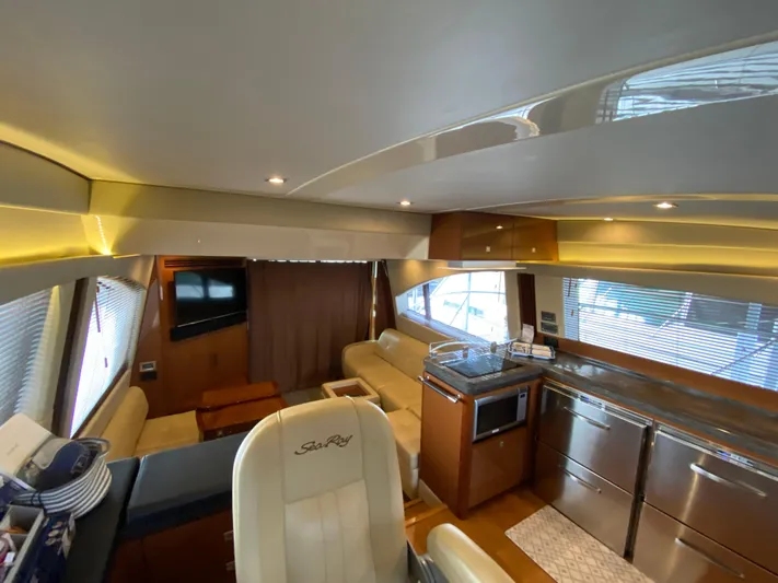 Yonder Star Yacht Photos Pics Luxurious interior of 2016 Sea Ray 510 Fly yacht with modern amenities and elegant design.