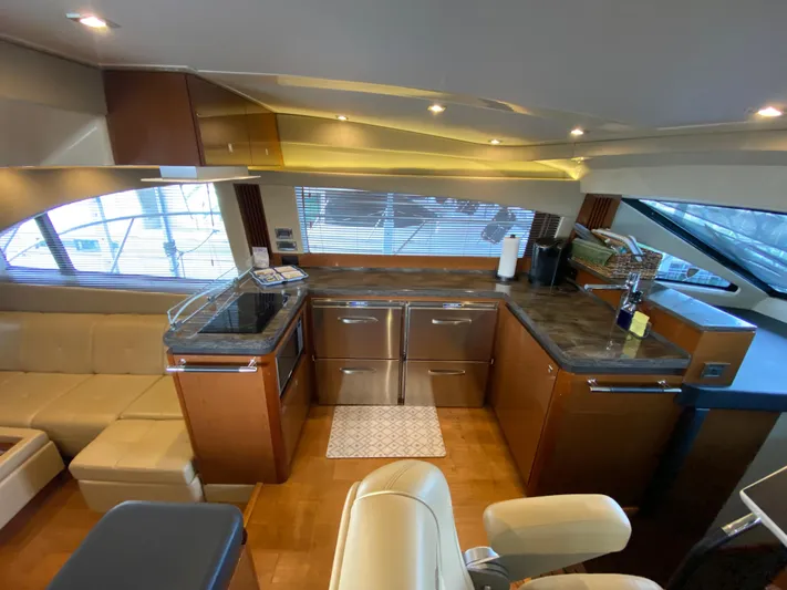 Yonder Star Yacht Photos Pics Luxurious interior of 2016 Sea Ray 510 Fly yacht with modern kitchen amenities.