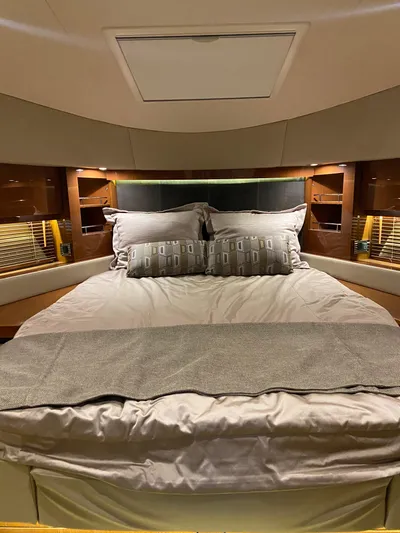 Yonder Star Yacht Photos Pics Luxurious bedroom interior of 2016 Sea Ray 510 Fly yacht with elegant bedding.
