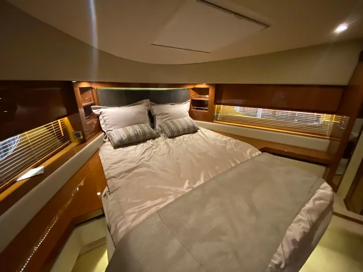 Yonder Star Yacht Photos Pics Luxurious bedroom interior of 2016 Sea Ray 510 Fly yacht with elegant bedding.