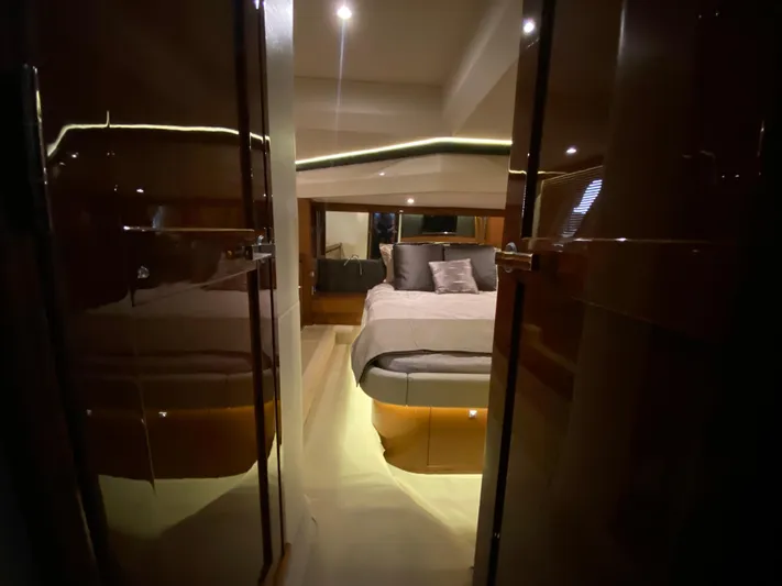 Yonder Star Yacht Photos Pics Luxurious bedroom interior of 2016 Sea Ray 510 Fly yacht with modern lighting.