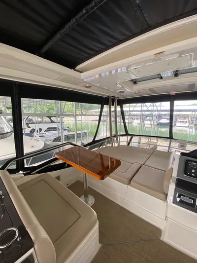 Yonder Star Yacht Photos Pics Interior of 2016 Sea Ray 510 Fly yacht with seating and table.