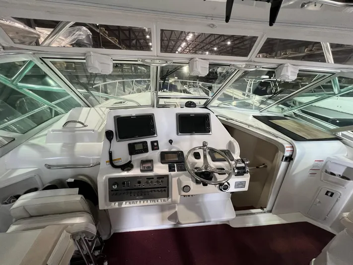  Yacht Photos Pics Helm of 2011 Rampage 41 Express boat with modern navigation equipment.