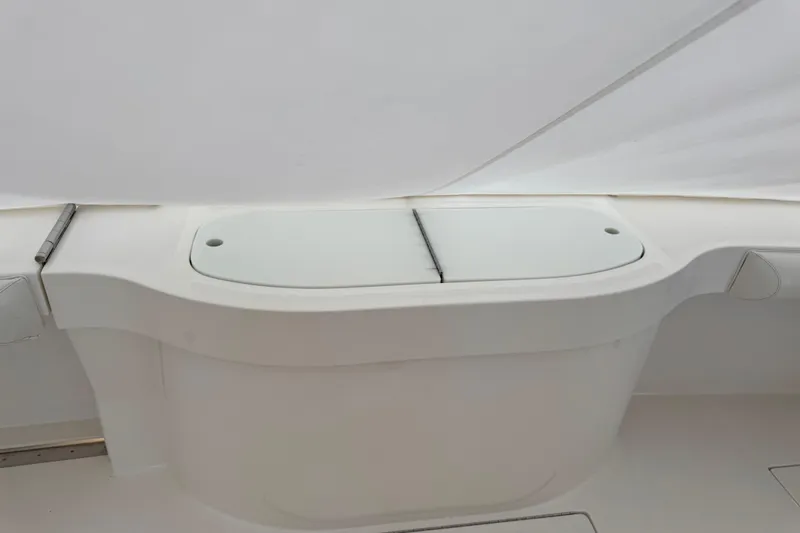 Regalo Yacht Photos Pics 2013 Cabo 44 Hardtop Express boat interior detail with white storage compartment.