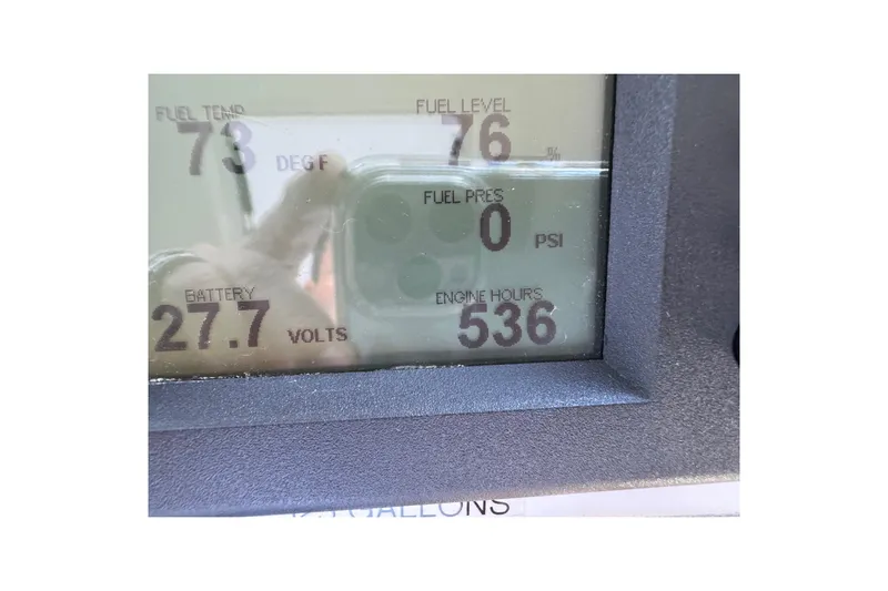 Regalo Yacht Photos Pics Display panel of 2013 Cabo 44 Hardtop Express showing fuel and engine metrics.