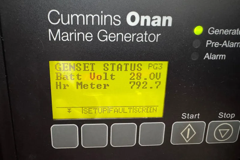 Regalo Yacht Photos Pics Cummins Onan marine generator display showing battery voltage and hour meter for Cabo 44 Hardtop Express.