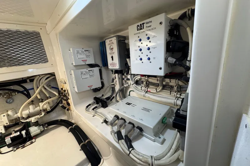 Regalo Yacht Photos Pics Engine room of 2013 Cabo 44 Hardtop Express with CAT Marine Power systems.