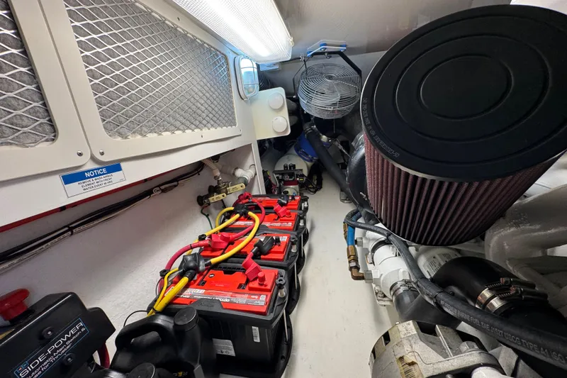 Regalo Yacht Photos Pics Engine room of 2013 Cabo 44 Hardtop Express with batteries and ventilation system.