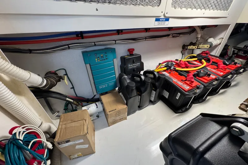 Regalo Yacht Photos Pics Engine room of 2013 Cabo 44 Hardtop Express with batteries and equipment.