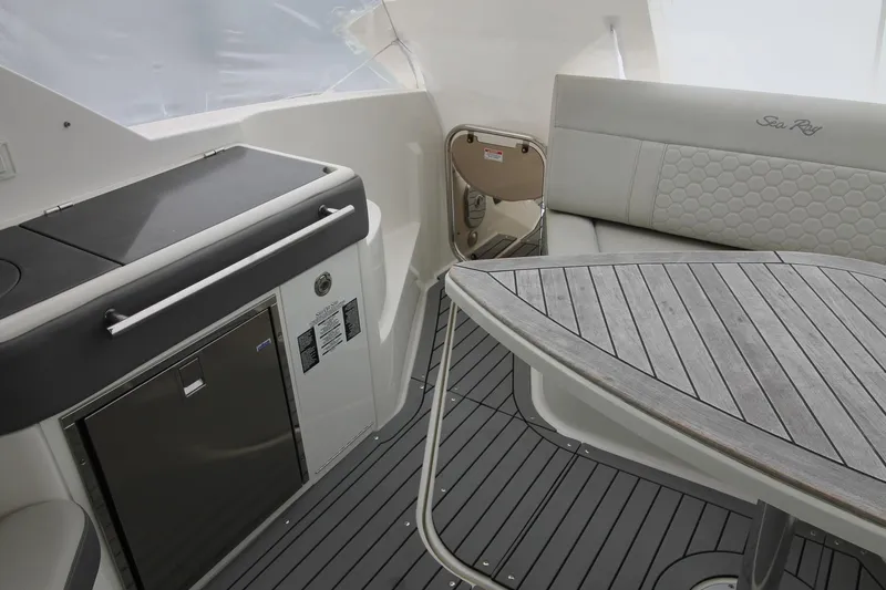  Yacht Photos Pics 2020 Sea Ray Sundancer 320 interior with sleek seating and modern amenities.