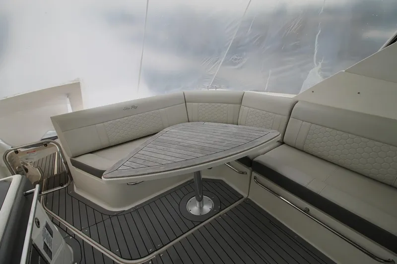  Yacht Photos Pics Luxurious seating area on 2020 Sea Ray Sundancer 320 yacht with elegant table.