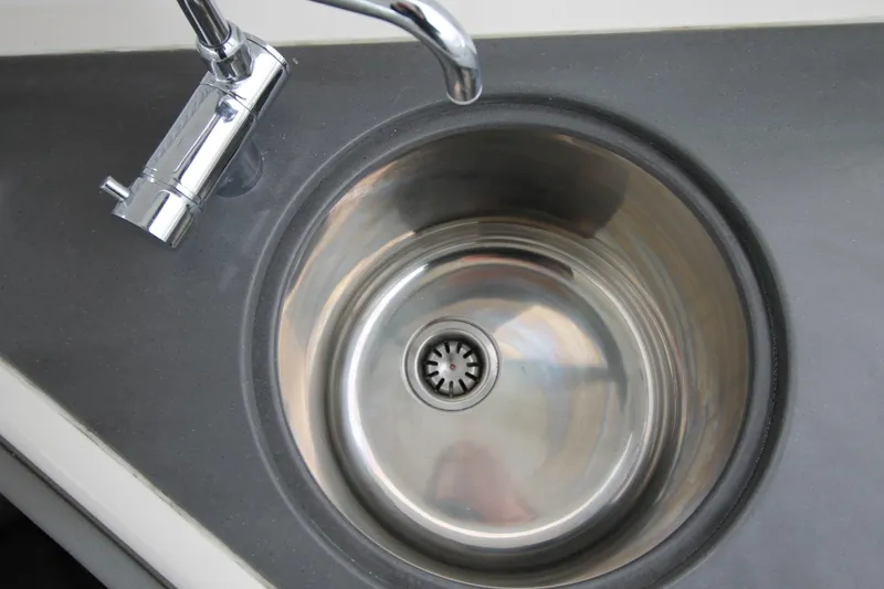  Yacht Photos Pics Stainless steel sink and faucet on 2020 Sea Ray Sundancer 320 yacht.