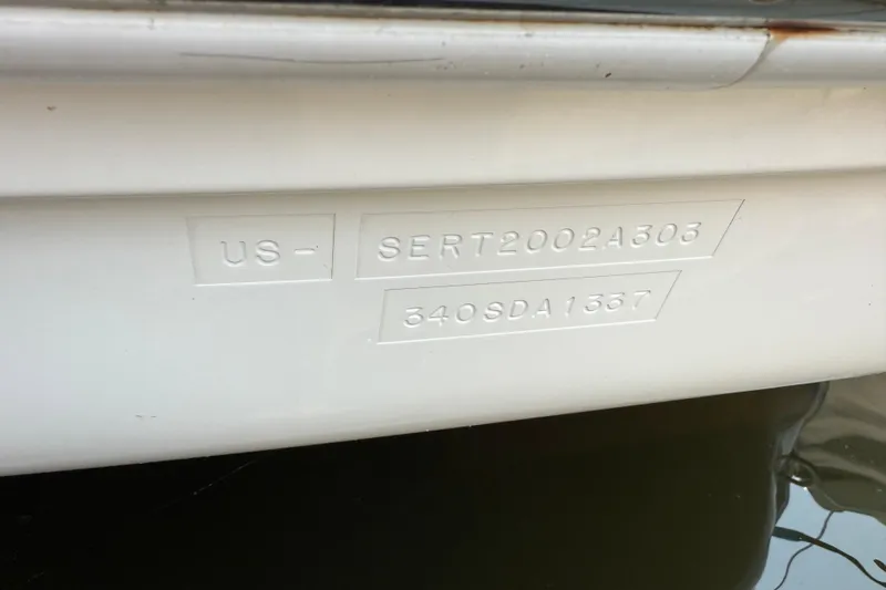 Yacht Photos Pics 2003 Sea Ray 340 Sundancer hull identification number on white surface.