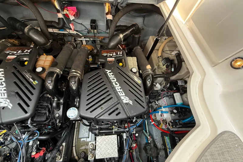  Yacht Photos Pics Engine compartment of a 2003 Sea Ray 340 Sundancer with Mercury engines.