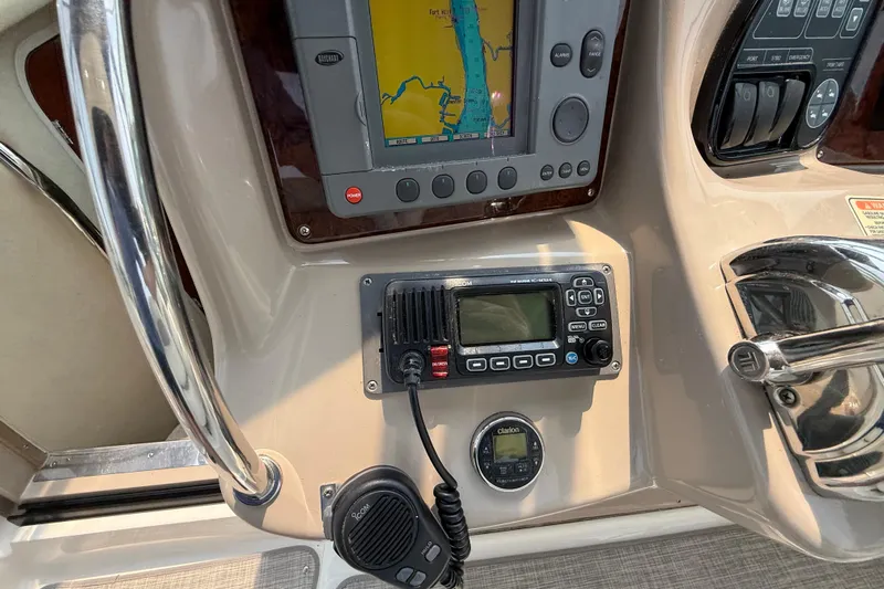  Yacht Photos Pics Control panel of a 2003 Sea Ray 340 Sundancer with navigation and communication equipment.