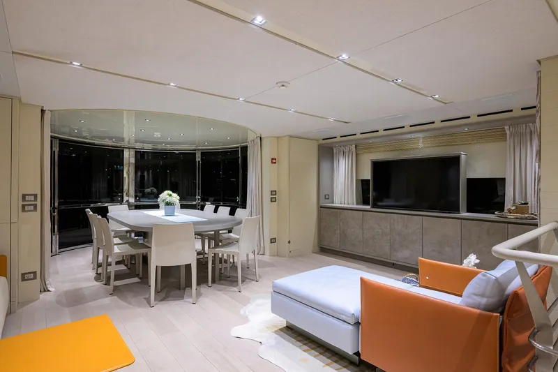 Phoenix Yacht Photos Pics Luxurious interior of 2019 Sanlorenzo SD112 yacht with modern dining and living area.