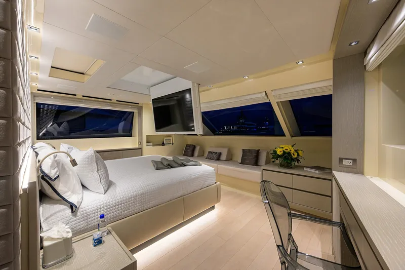 Phoenix Yacht Photos Pics Luxurious 2019 Sanlorenzo SD112 yacht bedroom with modern decor and large windows.