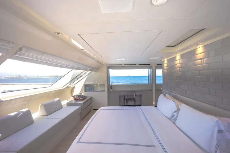 Phoenix Yacht Photos Pics Luxurious Sanlorenzo SD112 yacht bedroom with ocean view, modern decor, and elegant furnishings, 2019 model.