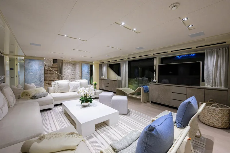 Phoenix Yacht Photos Pics Luxurious interior of 2019 Sanlorenzo SD112 yacht with elegant seating and modern decor.
