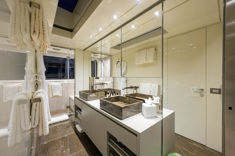Phoenix Yacht Photos Pics Luxurious bathroom on 2019 Sanlorenzo SD112 yacht with dual sinks and elegant decor.