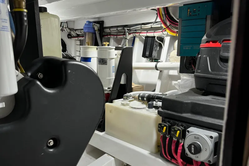 Thunder Yacht Photos Pics Engine room of 1962 Custom Carolina 36 Warren O'Neal boat, showcasing equipment and wiring.