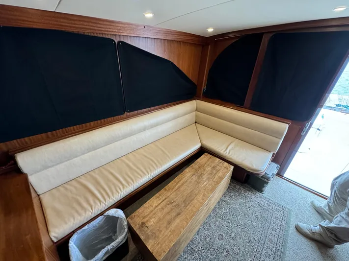 Thunder Yacht Photos Pics Luxurious interior of 1962 Custom Carolina 36 Warren O'Neal boat with beige seating and wooden accents.