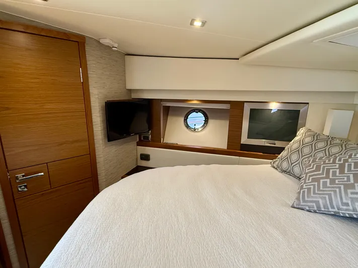  Yacht Photos Pics Luxurious cabin interior of 2017 Tiara Yachts C44 Coupe with modern amenities.