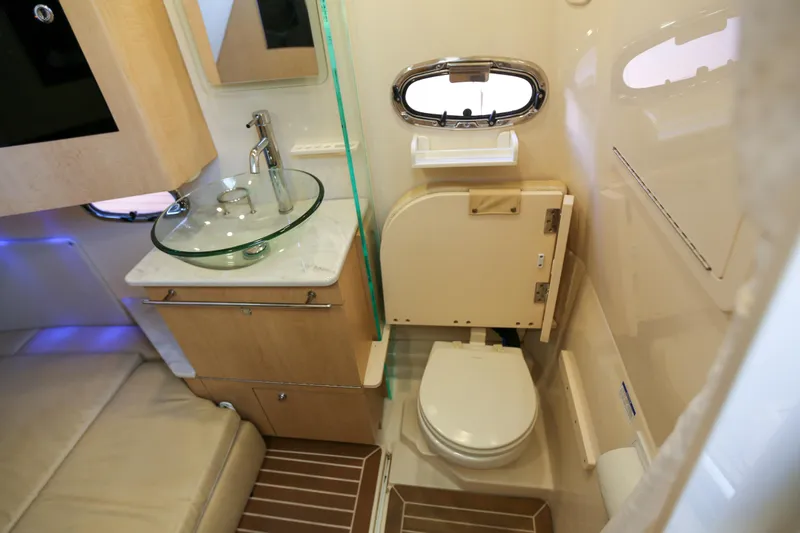  Yacht Photos Pics Luxurious 2017 Boston Whaler 370 Outrage cabin with modern bathroom amenities.