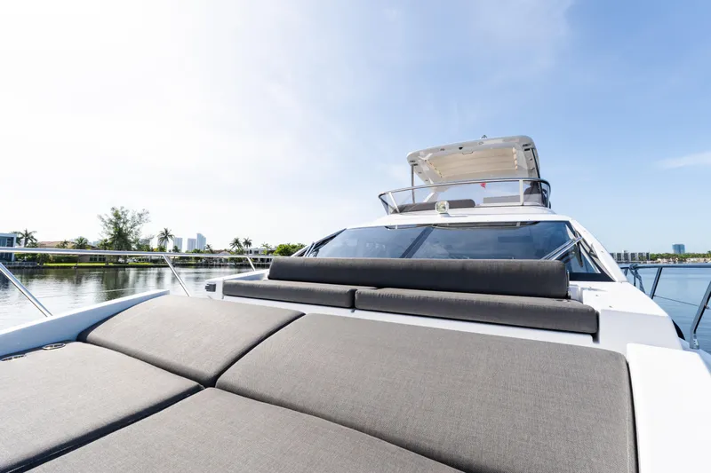 Andromeda Yacht Photos Pics 2023 Azimut Fly 50 yacht with spacious sunbathing area on calm water.