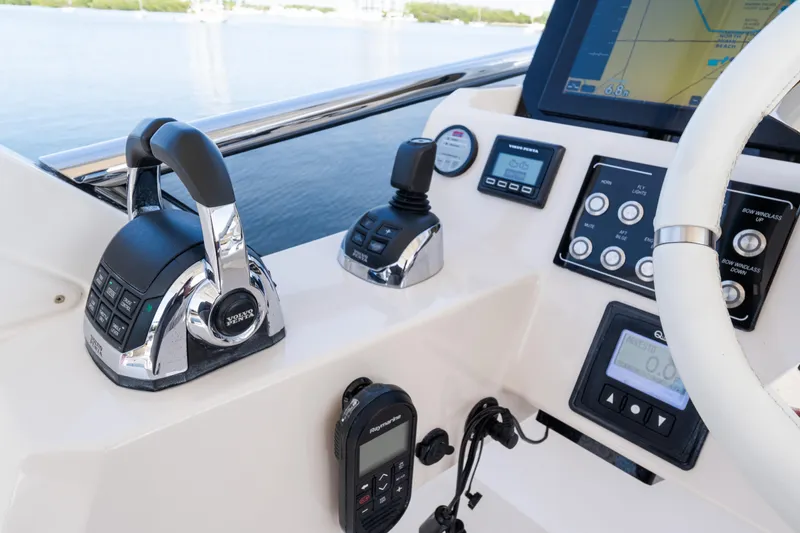 Andromeda Yacht Photos Pics Control panel of 2023 Azimut Fly 50 yacht with navigation and throttle systems.