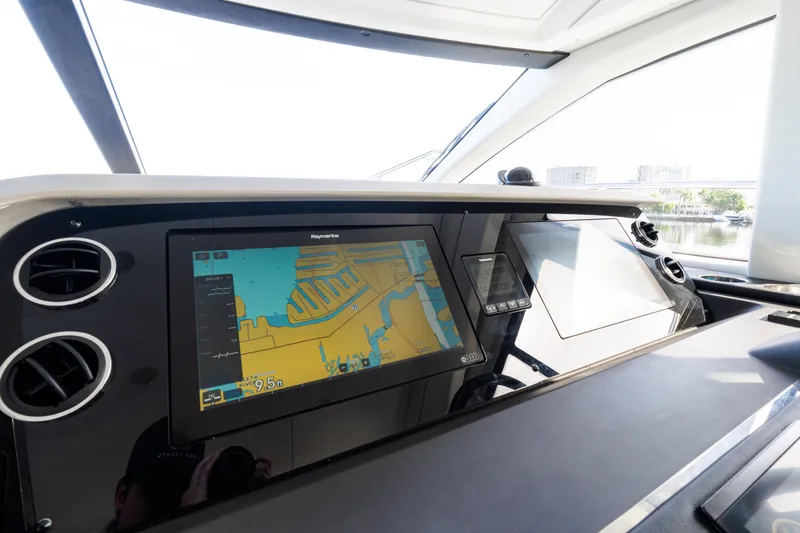 Andromeda Yacht Photos Pics 2023 Azimut Fly 50 yacht dashboard with navigation display and controls.