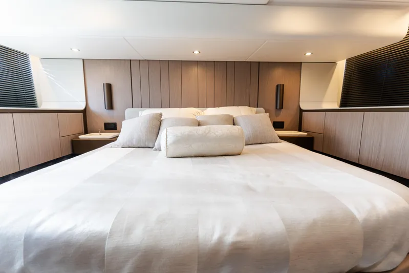 Andromeda Yacht Photos Pics Luxurious bedroom interior of 2023 Azimut Fly 50 yacht with elegant bedding.