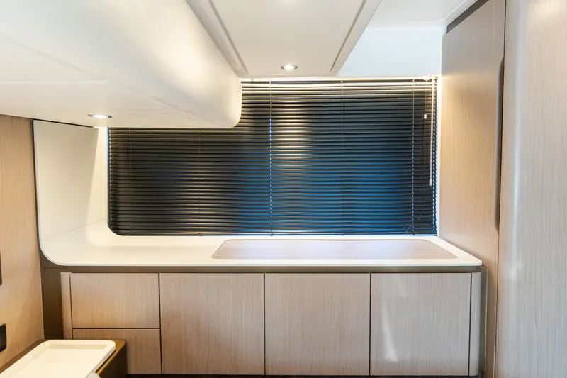 Andromeda Yacht Photos Pics Modern interior of 2023 Azimut Fly 50 yacht with sleek cabinetry and blinds.