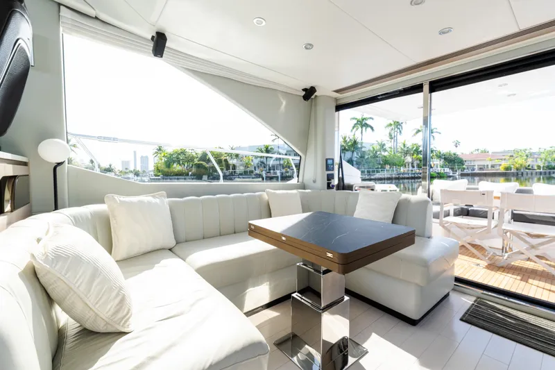Andromeda Yacht Photos Pics Luxurious interior of 2023 Azimut Fly 50 yacht with elegant seating and scenic views.