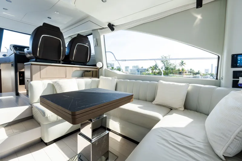Andromeda Yacht Photos Pics Luxurious interior of 2023 Azimut Fly 50 yacht with plush seating and modern design.