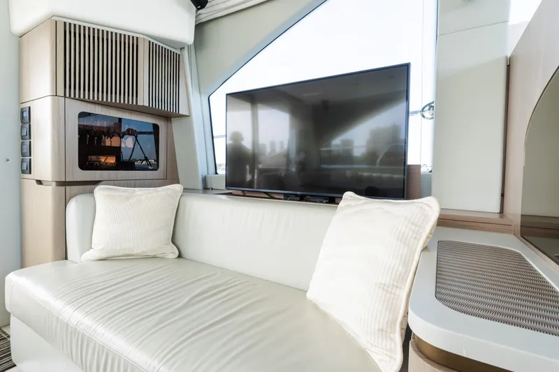 Andromeda Yacht Photos Pics Luxurious interior of 2023 Azimut Fly 50 yacht with modern sofa and TV.