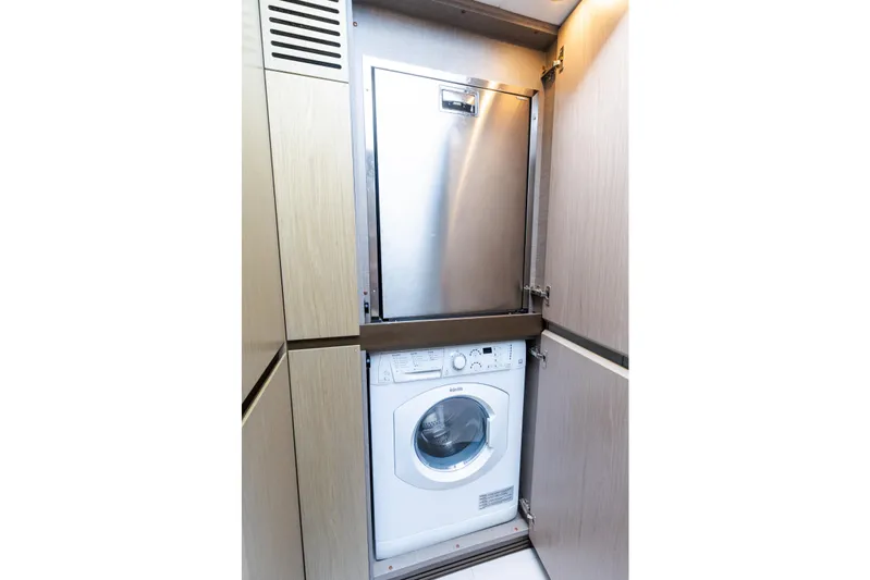 Andromeda Yacht Photos Pics 2023 Azimut Fly 50 yacht interior with built-in washer and dryer.